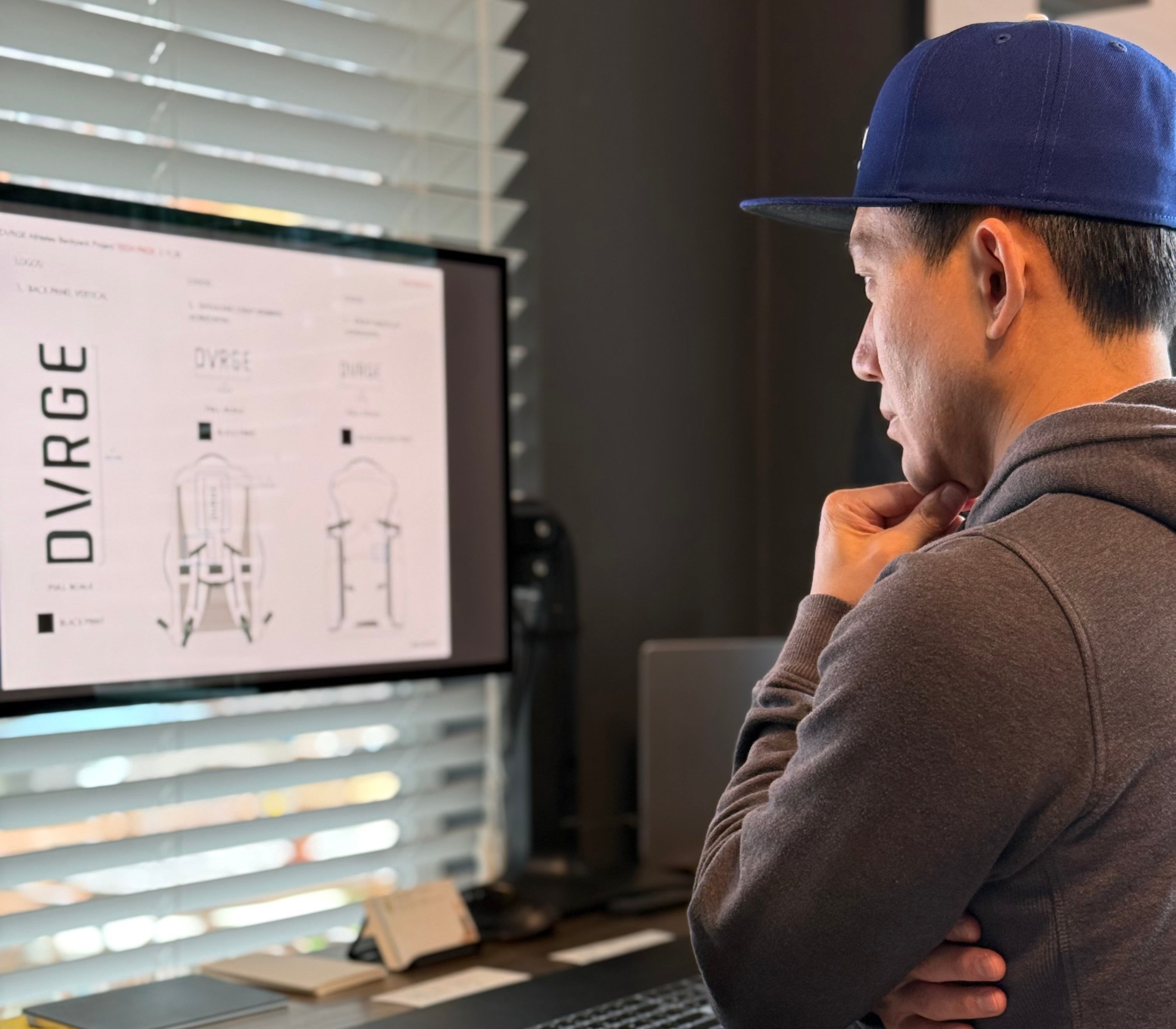 Andy reviews the blueprint design of DVRGE travel backpack