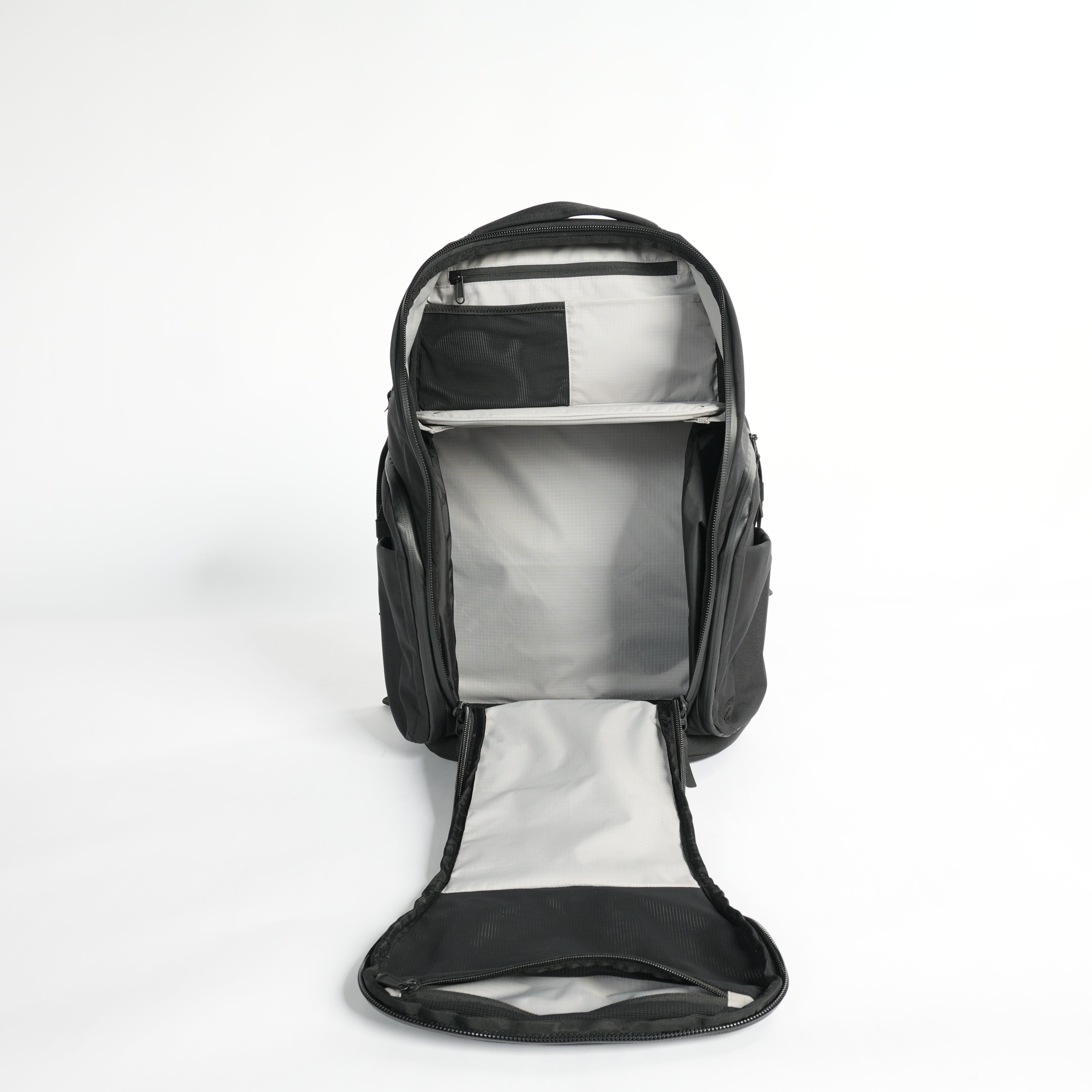 Clamshell pocket opened on DVRGE athletic backpack