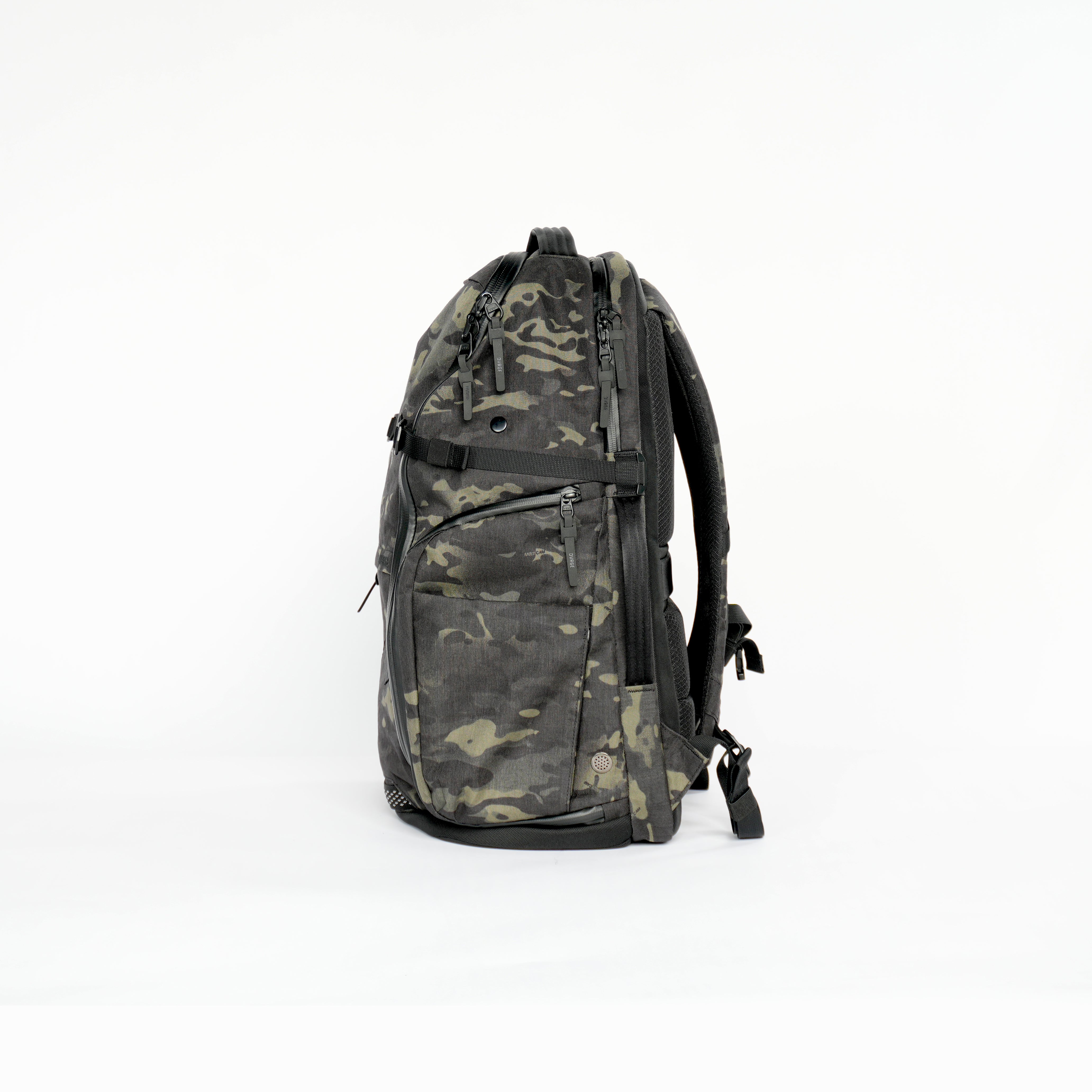 Side view of DVRGE X50 36L – Waterproof X-Pac® X50 Black Multicam® - LIMITED EDITION backpack on white background